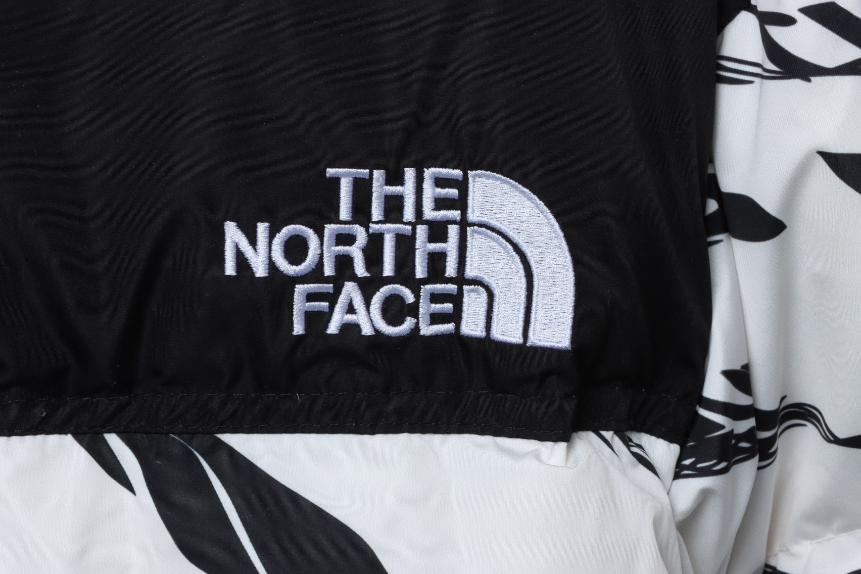 White ‘ZebraLogoPattern’ Down Jacket