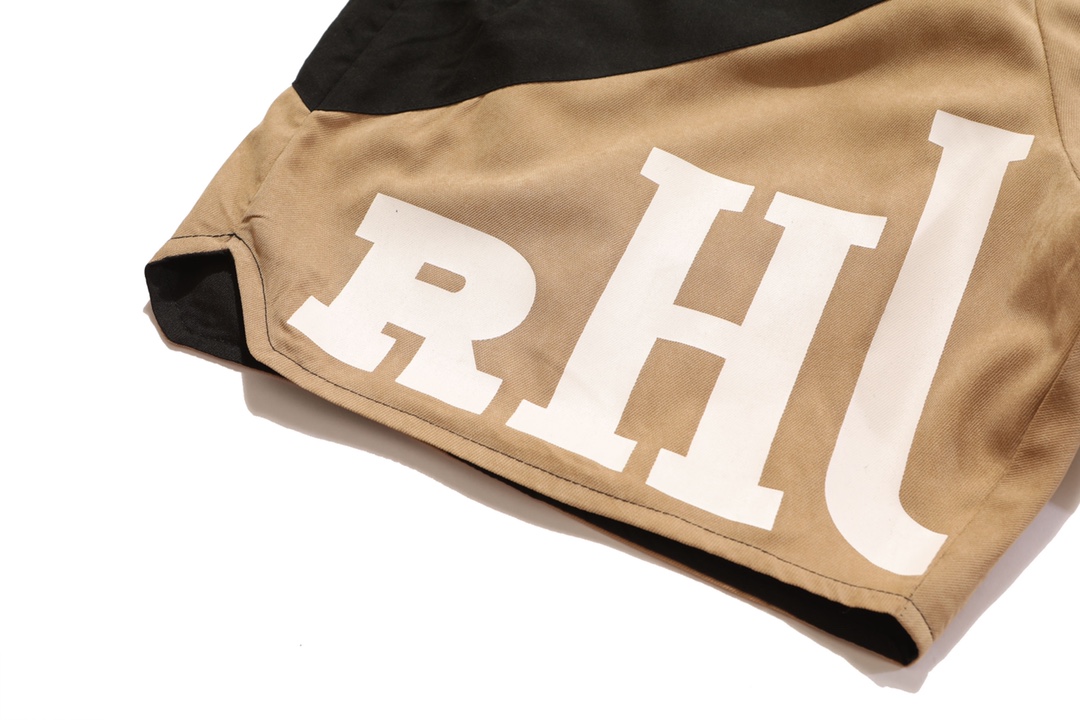 RHUDE vintage logo print two-tone drawstring shorts